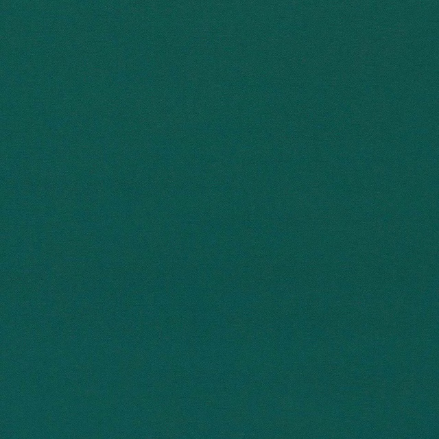 Deep bottle green velvet swatch with a smooth, even pile and soft sheen