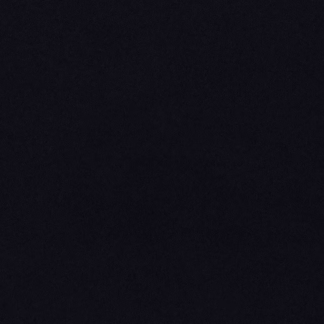 Deep carbon black velvet swatch with a soft, light-catching pile