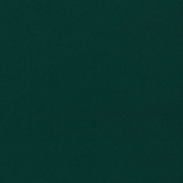 Deep forest green velvet swatch with a smooth, low-sheen pile