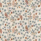 Cream fabric printed with teal pine sprays, owls and brown pinecones