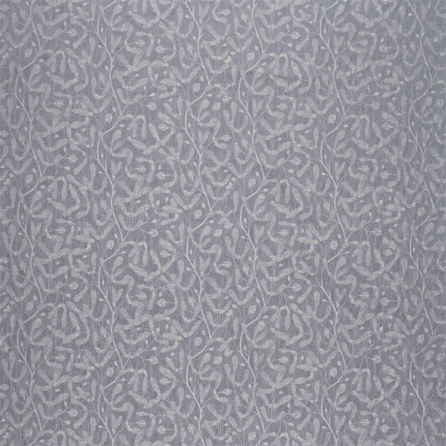 Close-up of woven botanical fabric in charcoal and pale grey