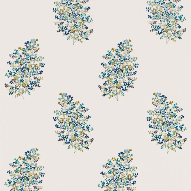 Scattered embroidered floral sprigs in blue, teal and olive on a pale ground