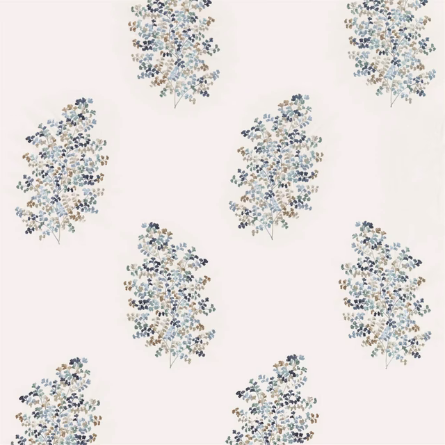 Cream fabric swatch with scattered indigo and Wedgwood embroidered leaf sprays