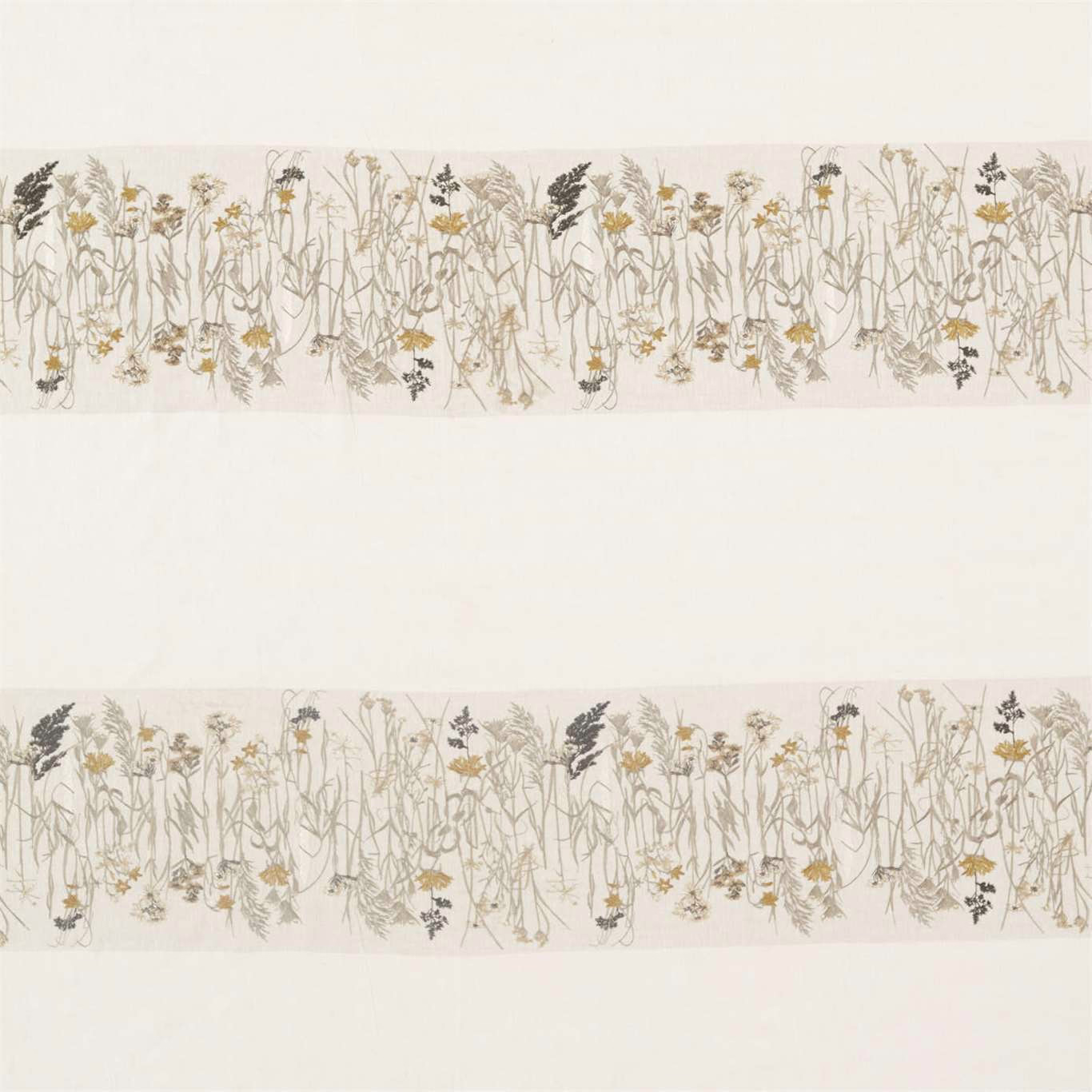 Pale botanical stripe fabric with sable stems and corn-yellow flowers on an ivory ground