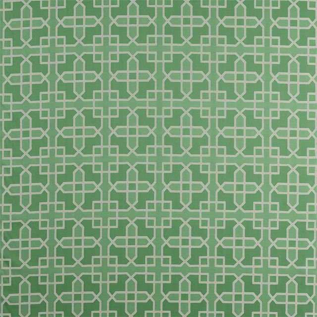 Green geometric fabric swatch with pale lattice motif and crisp woven texture