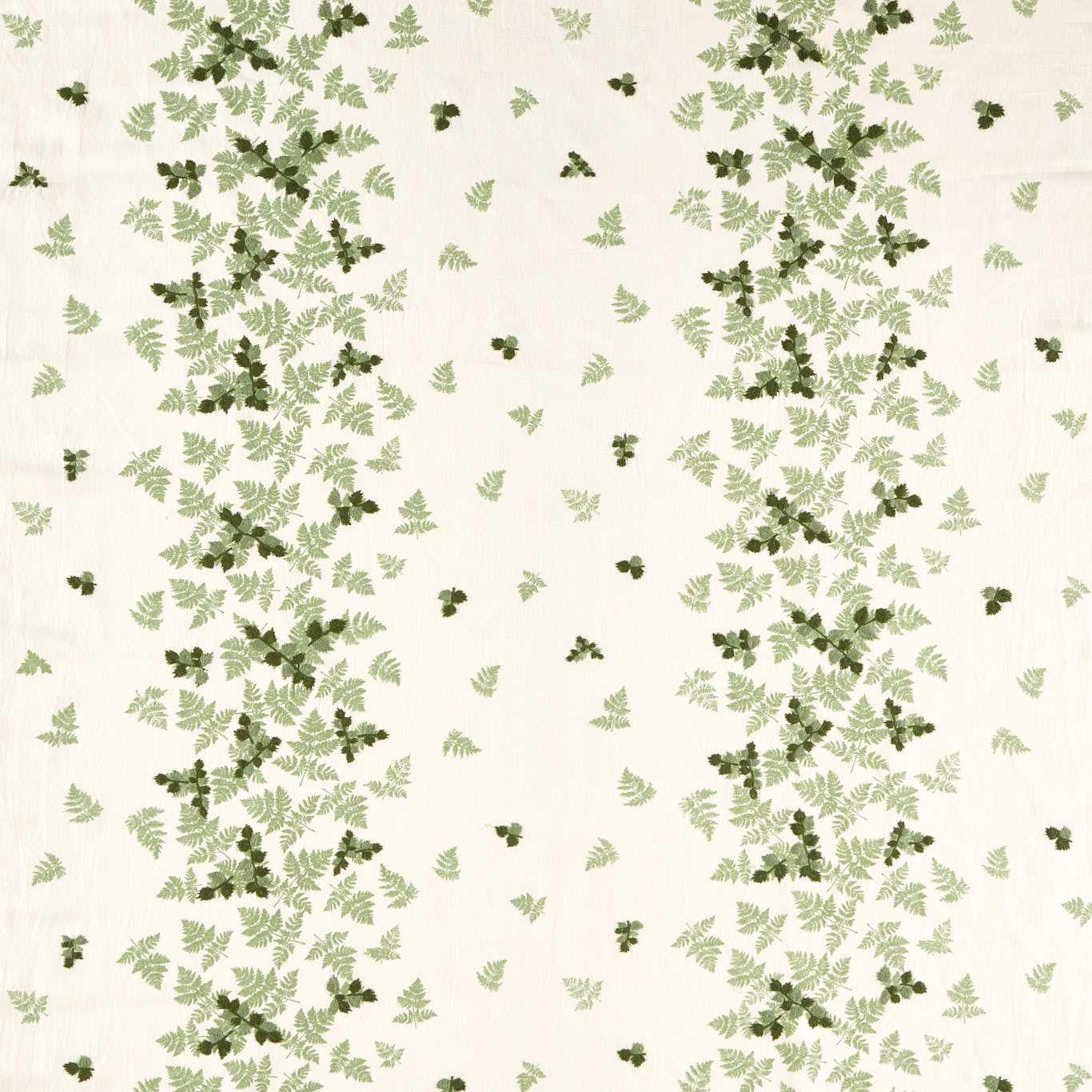 Cream fabric swatch with scattered silver-green fern leaves and darker moss accents
