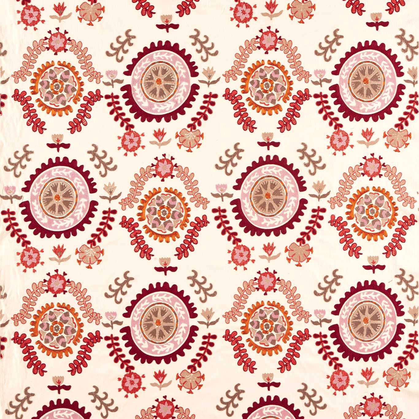 Mulberry and pink suzani embroidery pattern on a cream ground