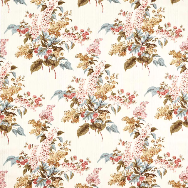 Large-scale floral fabric on a cream ground with blue, pink and sepia blossoms