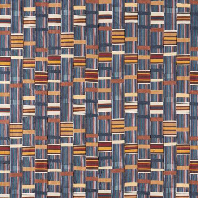 Woven geometric fabric with blue, russet, cream and gold striped blocks