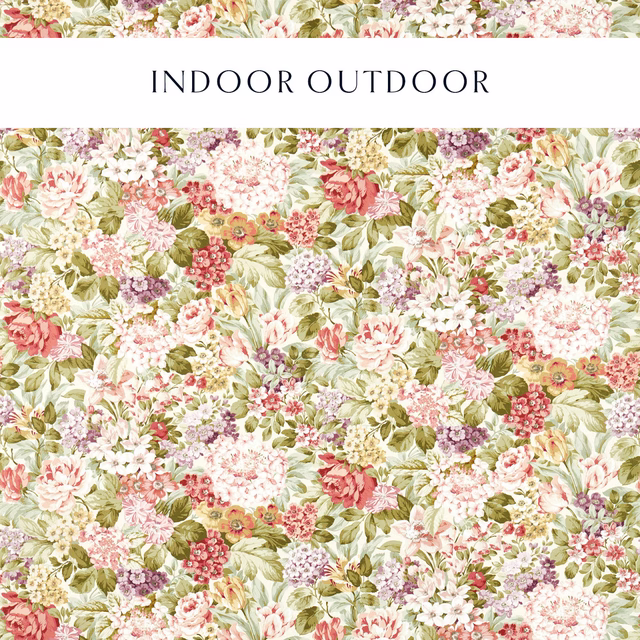 Dense floral print in blush, coral, lilac and olive on a pale ground