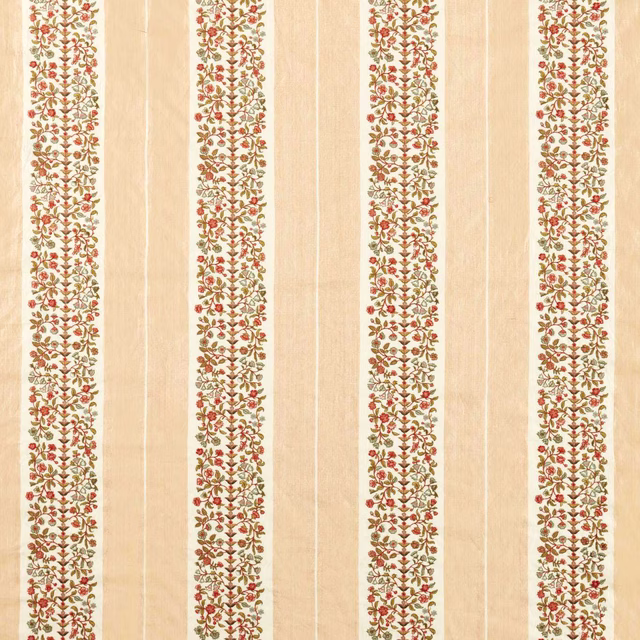 Cream striped fabric swatch with narrow floral vine embroidery in green, blush and coral