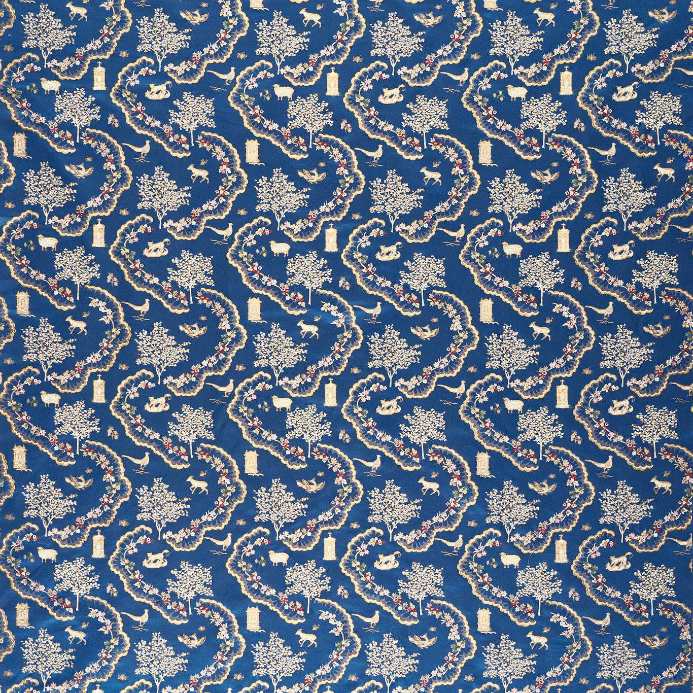 Blue brocade fabric with cream floral, animal and garden motifs