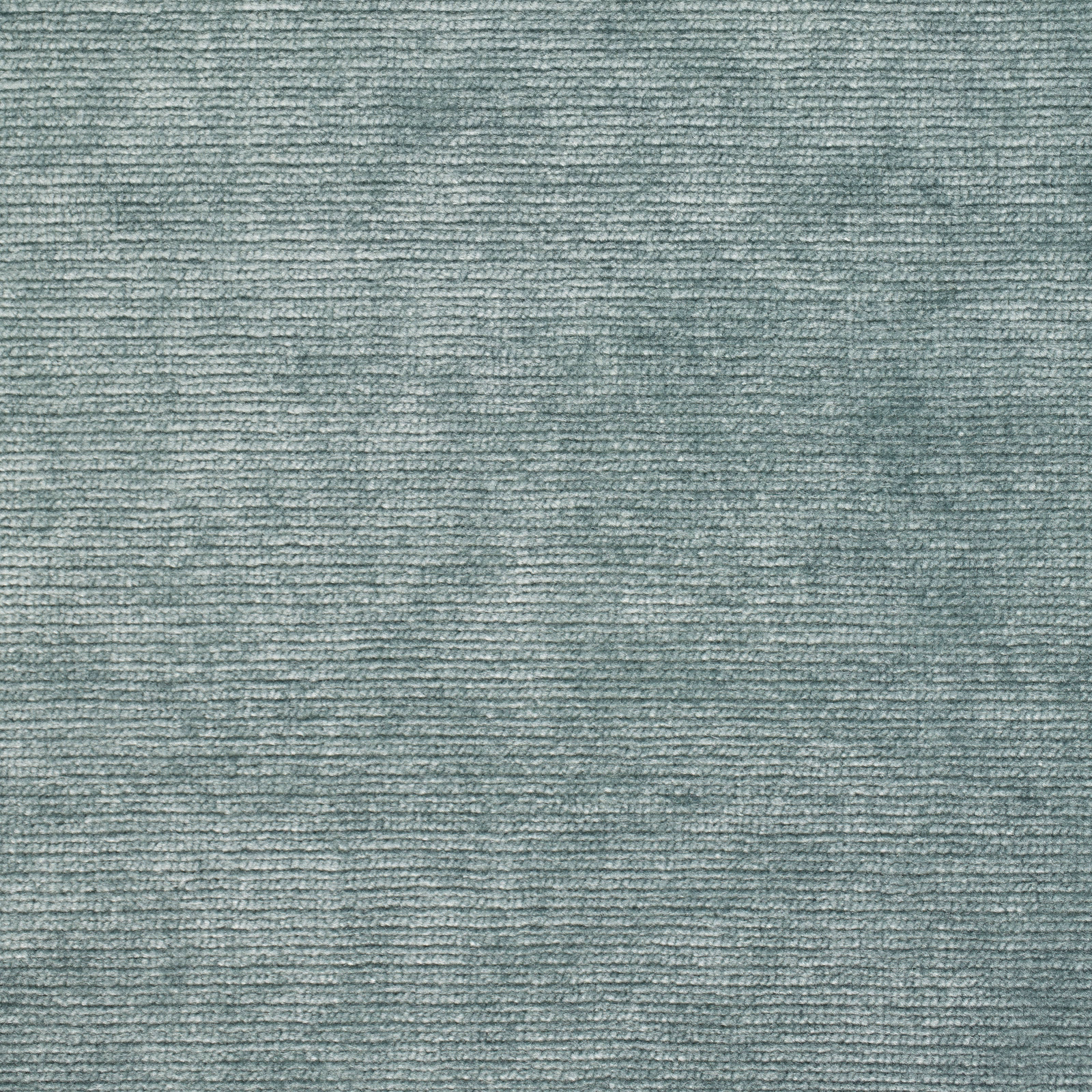 Close-up of celadon green velvet with a soft, ribbed pile texture