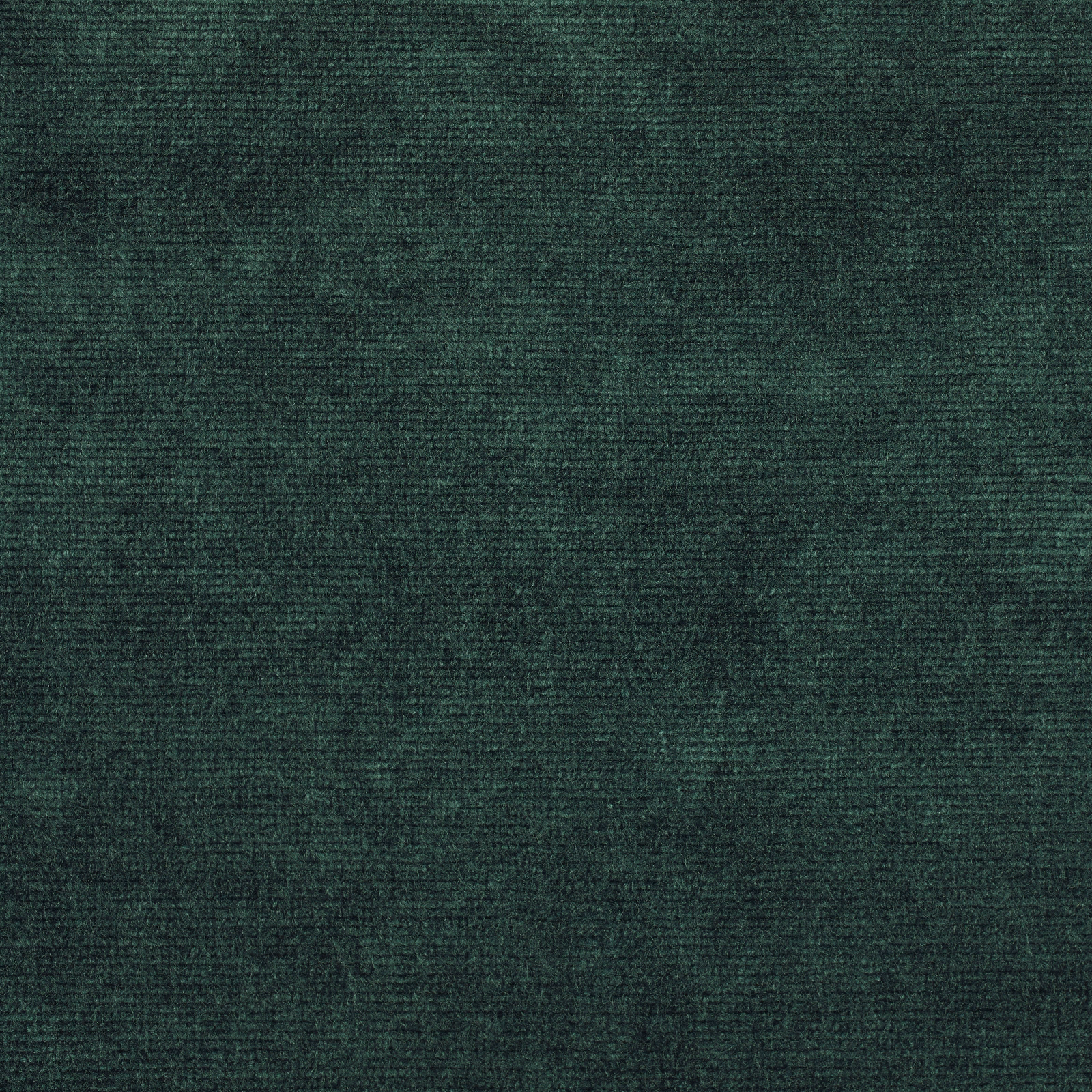 Deep emerald green velvet with a dense, softly mottled pile