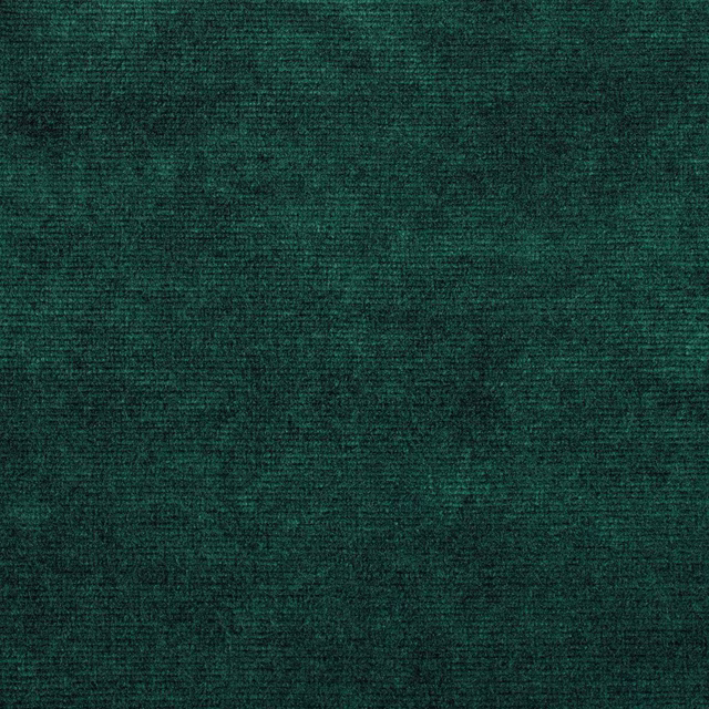 Deep emerald green velvet with a dense, softly mottled pile