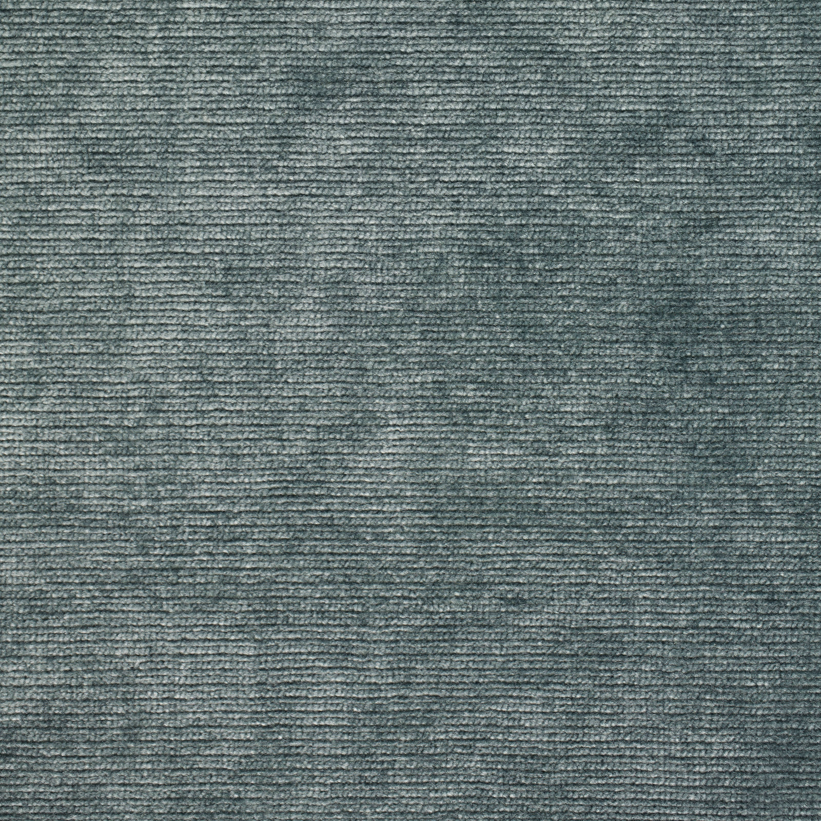 Close-up of muted teal velvet with a soft directional sheen