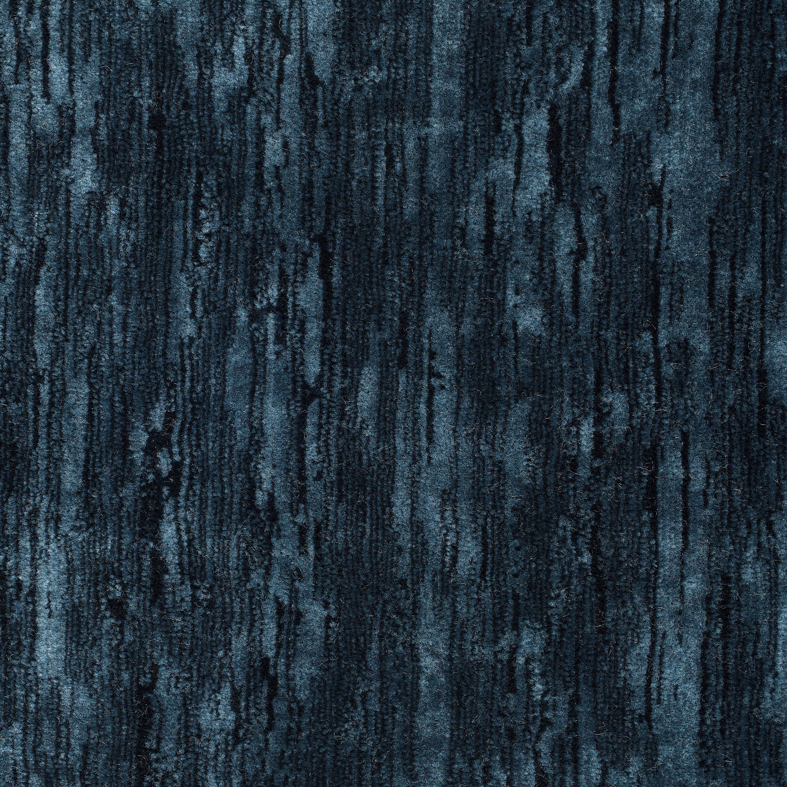 Deep teal and indigo velvet with vertical brushed striations and dark mottled texture