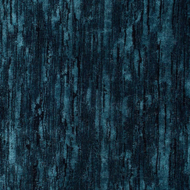 Deep teal and indigo velvet with vertical brushed striations and dark mottled texture
