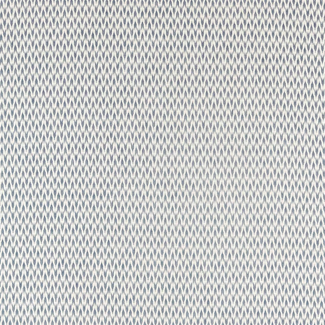Close-up of a small indigo woven repeat on a pale ground