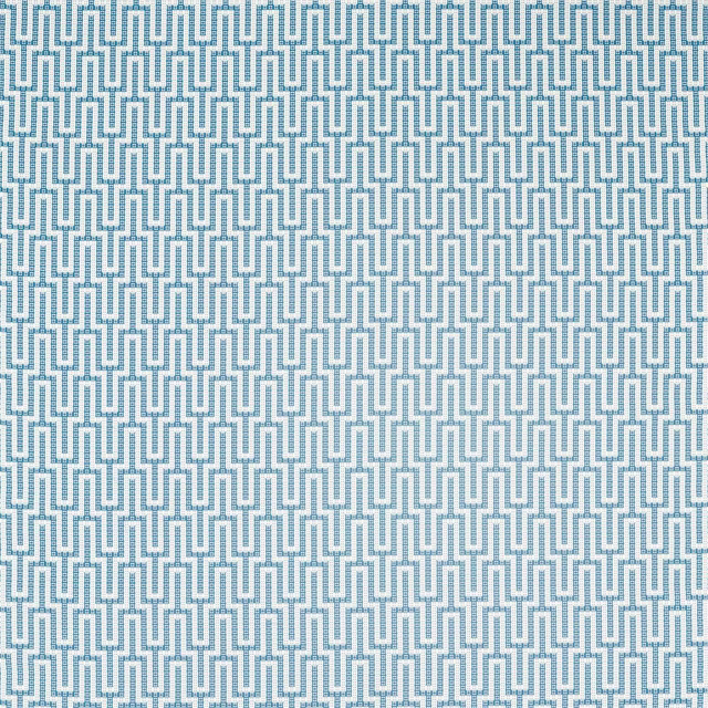 Blue geometric lattice weave on a pale ground, shown as a fabric swatch