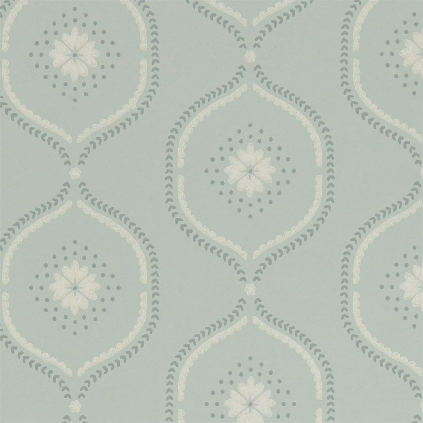 Pale mist-blue wallpaper with cream floral medallions and muted sage dotted detailing