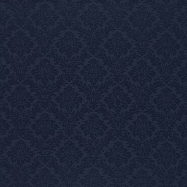 Dark indigo damask fabric with tonal floral medallions and dense woven texture