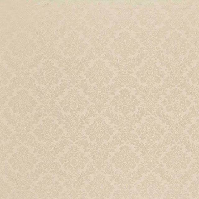 Pale linen cream damask fabric with tonal scrolling medallions and a soft woven finish