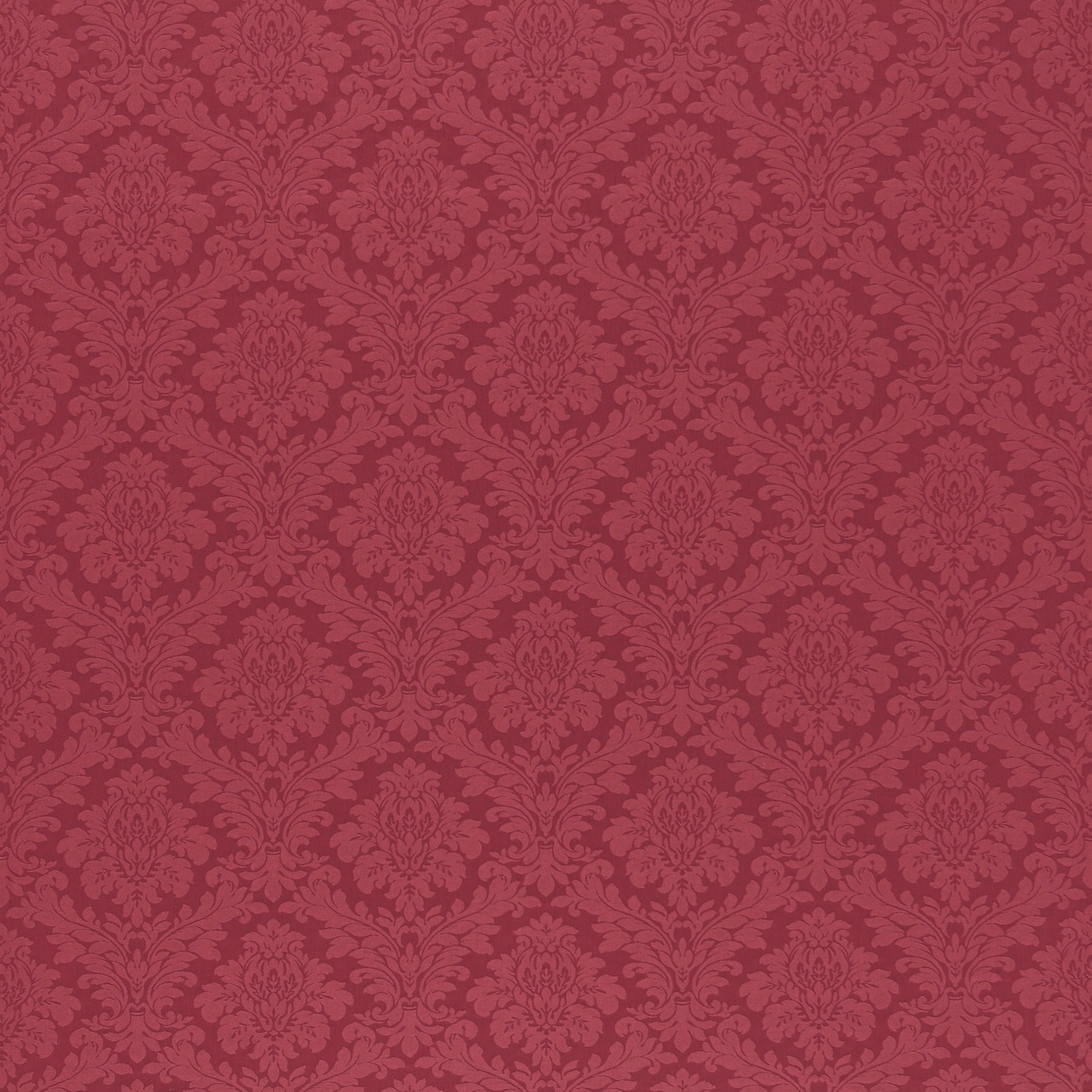 Deep raspberry damask fabric with tonal scrolling floral motifs
