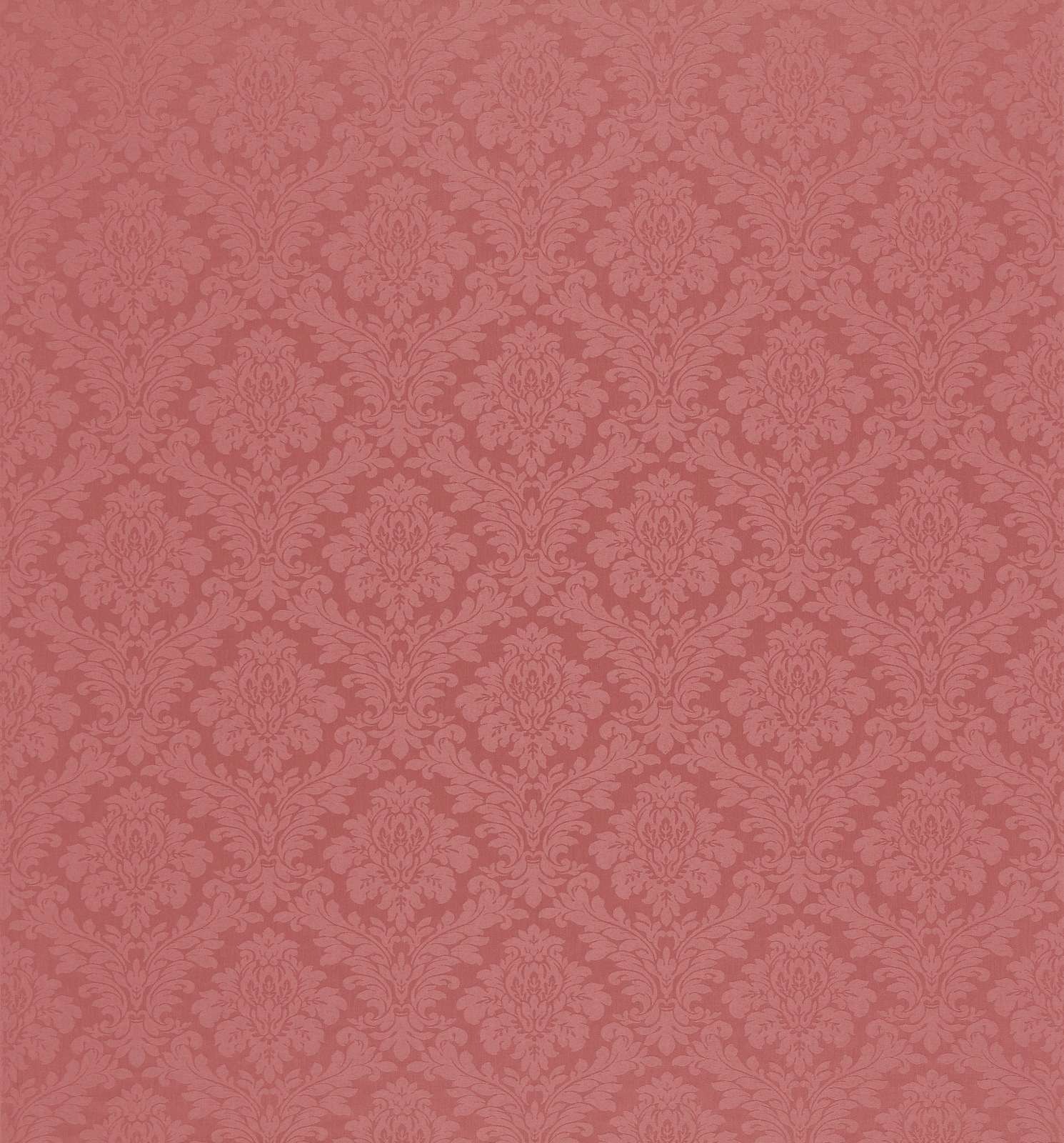 Muted rose pink damask fabric with tonal floral motifs and smooth woven texture