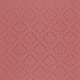 Muted rose pink damask fabric with tonal floral motifs and smooth woven texture