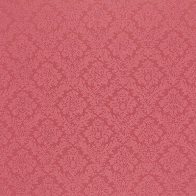 Muted rose pink damask fabric with tonal floral motifs and smooth woven texture