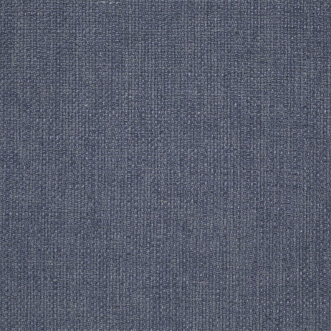 Close-up of a muted indigo blue textured plain weave fabric