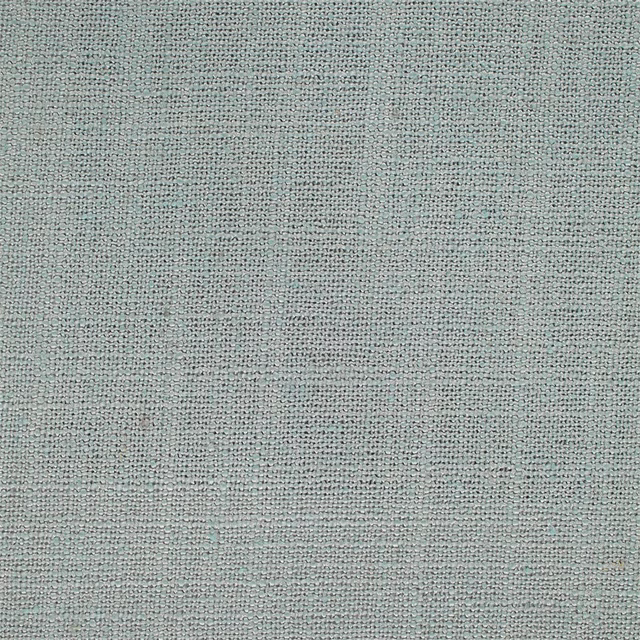 Close-up of a soft duck egg blue woven fabric with fine textured slubs