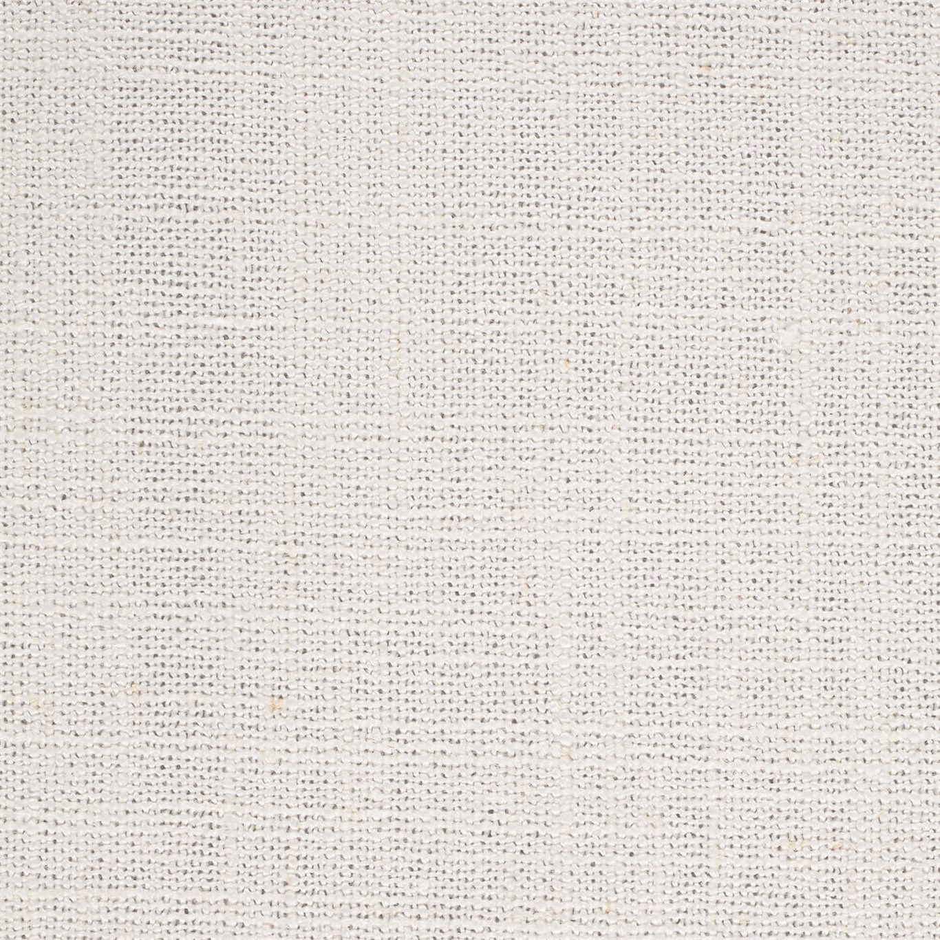 Close-up of soft ecru woven fabric with fine nubby texture and subtle slub specks