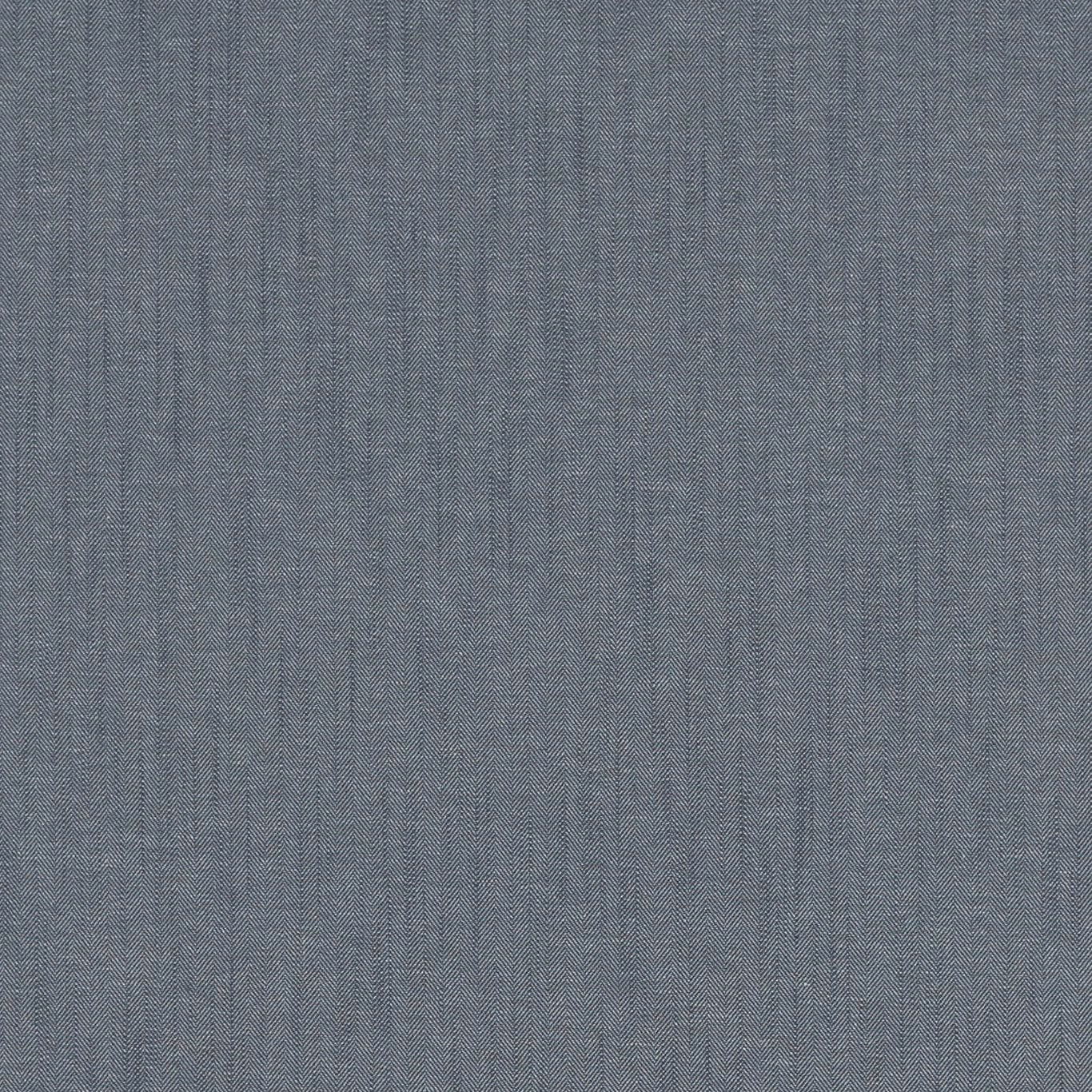 Close-up of a slate midnight-blue woven herringbone fabric with fine texture