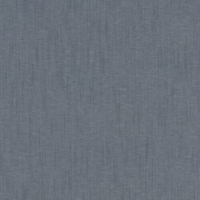Close-up of a slate midnight-blue woven herringbone fabric with fine texture