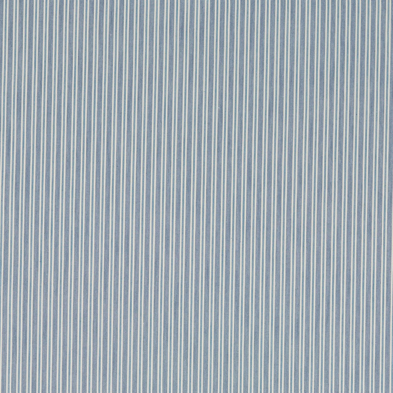 Close-up of narrow vertical blue and ivory pinstripes on a woven fabric swatch