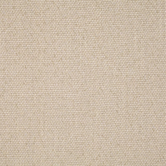 Close-up of a warm cream plain weave fabric with a fine, textured surface