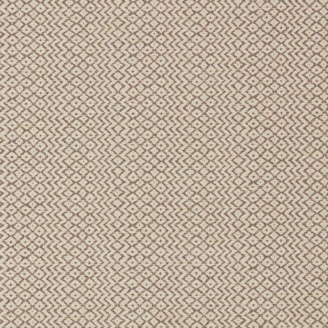 Close-up of a warm brown geometric weave with tiny diamonds and zigzags