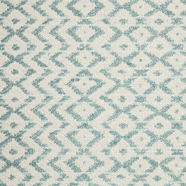 Cream woven fabric with soft teal geometric diamond motif