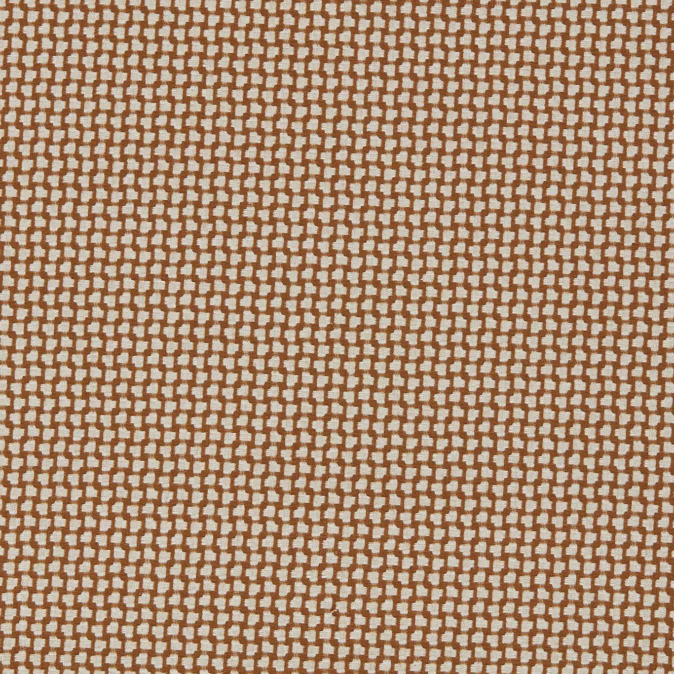 Close-up of warm bark-brown woven fabric with tiny cream geometric blocks