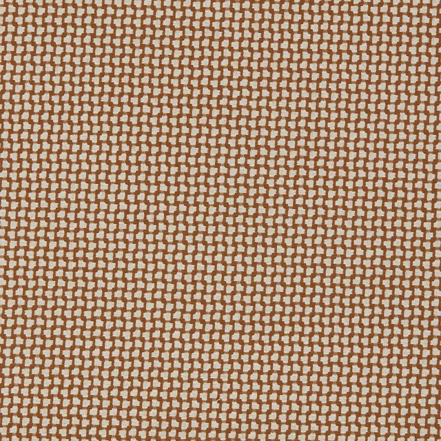 Close-up of warm bark-brown woven fabric with tiny cream geometric blocks
