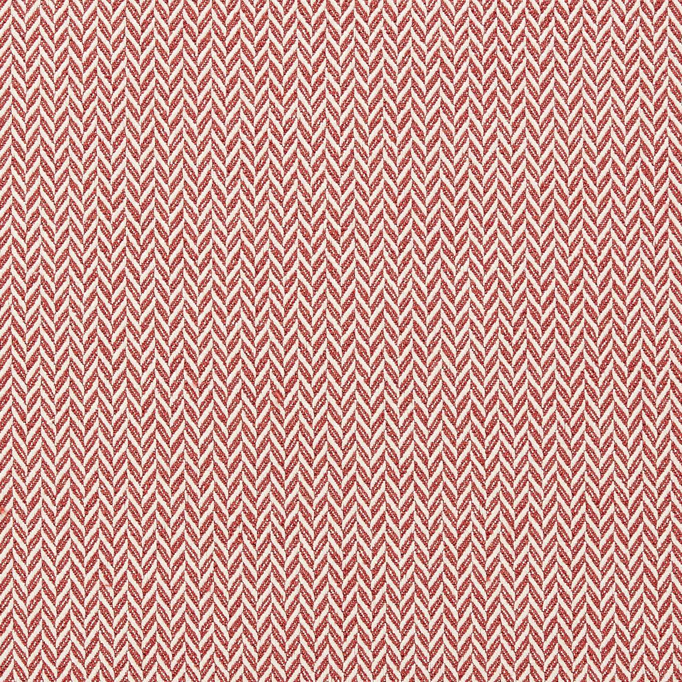 Close-up of a warm red herringbone woven fabric with cream highlights
