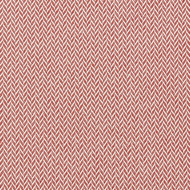 Close-up of a warm red herringbone woven fabric with cream highlights