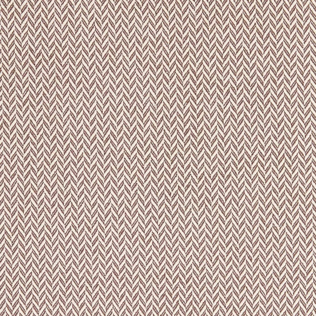 Close-up of warm chocolate brown herringbone woven fabric with natural threads