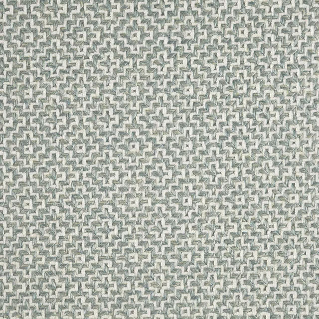 Close-up of pale mineral blue and ivory geometric woven fabric with a tight textured finish