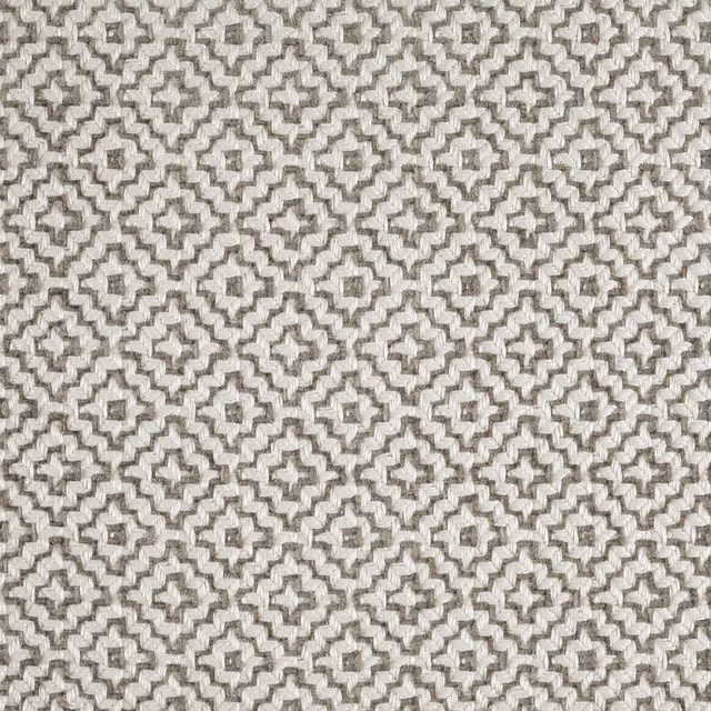 Close-up of a warm pebble-grey geometric woven fabric with cream and taupe detail