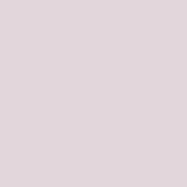 a flat tile of pale blush pink paint