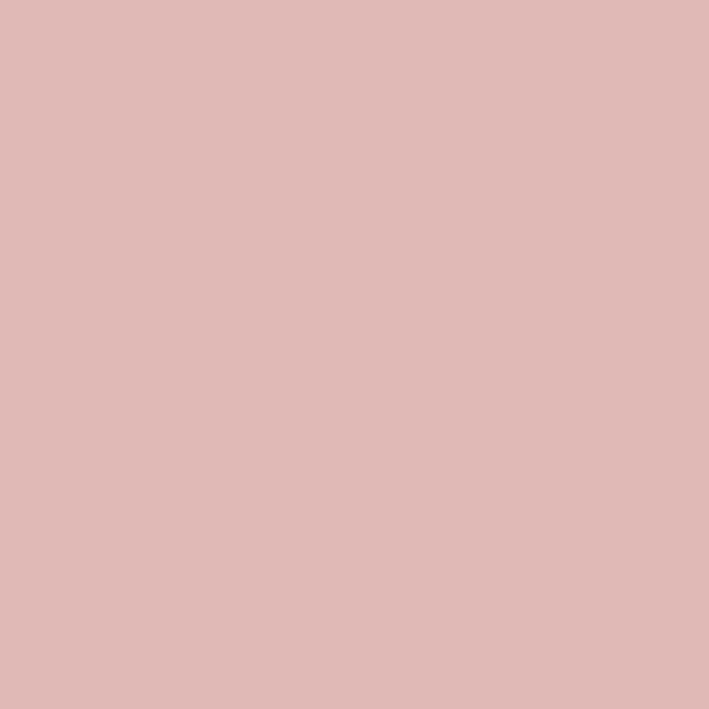 a flat tile of soft blush pink paint