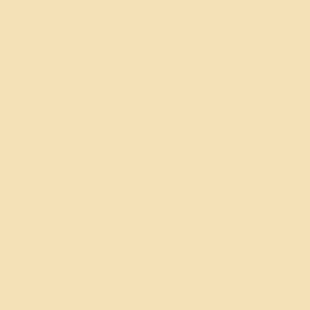 a flat tile of warm ivory paint